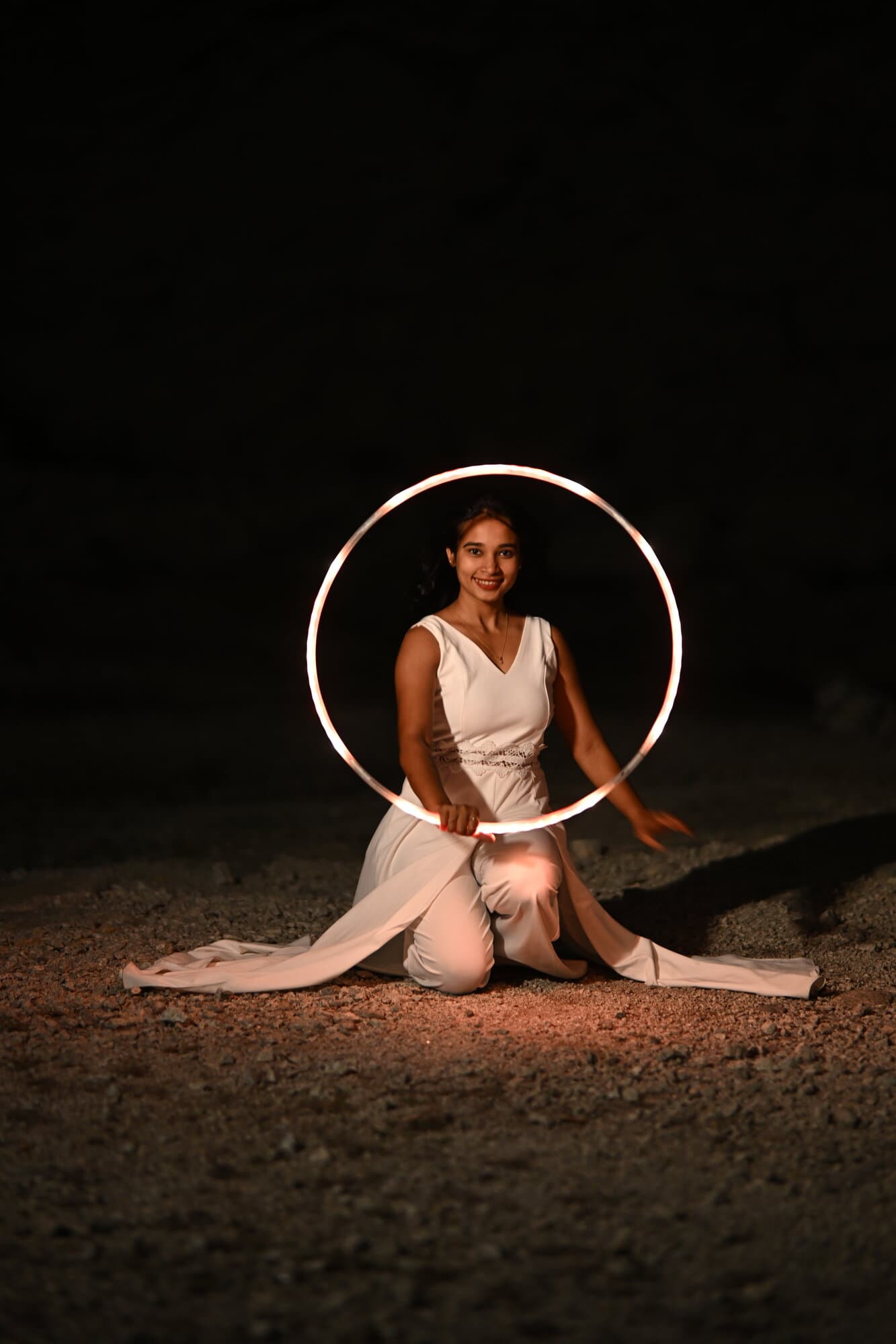 Devina performing an LED hoop routine